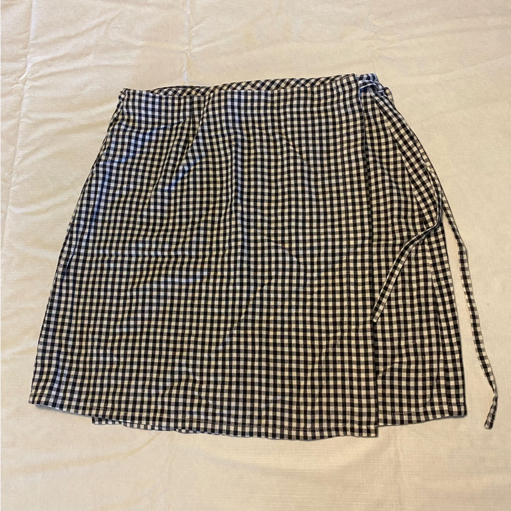 Black and white gingham mini wrap skirt.